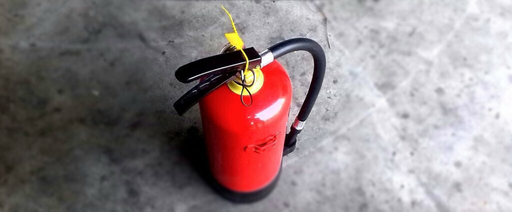 Image of a fire extinguisher symbolsing the start of extinguishing your debts